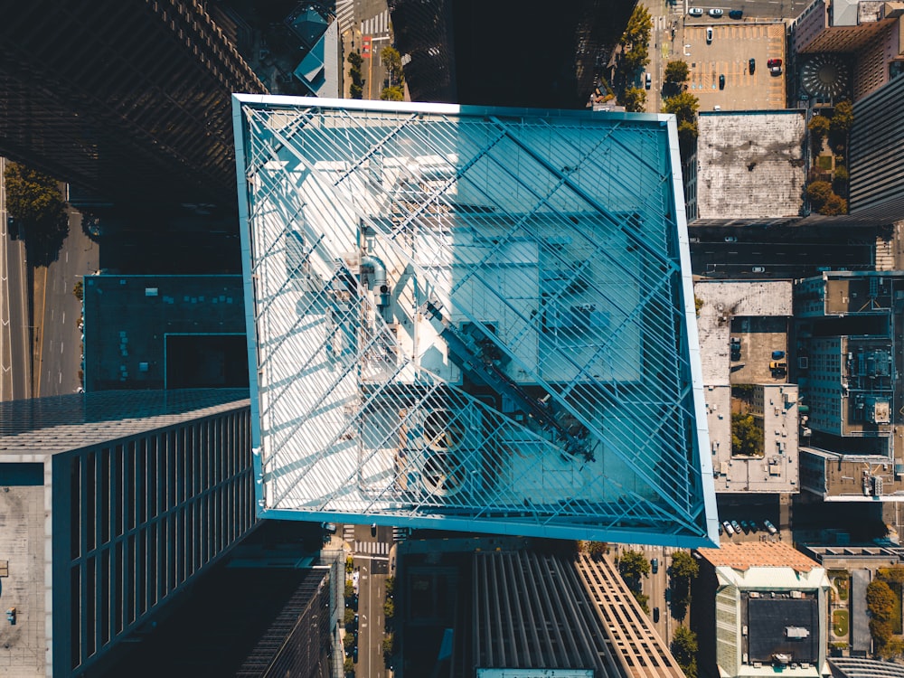 an aerial view of a building with a glass structure