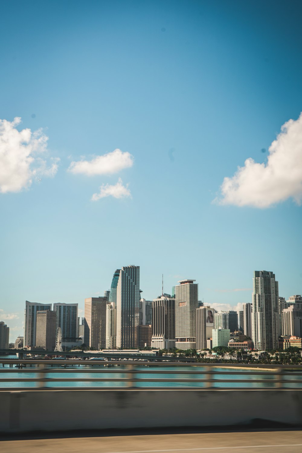 a view of a city from a moving car