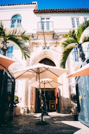 an open umbrella in front of a building