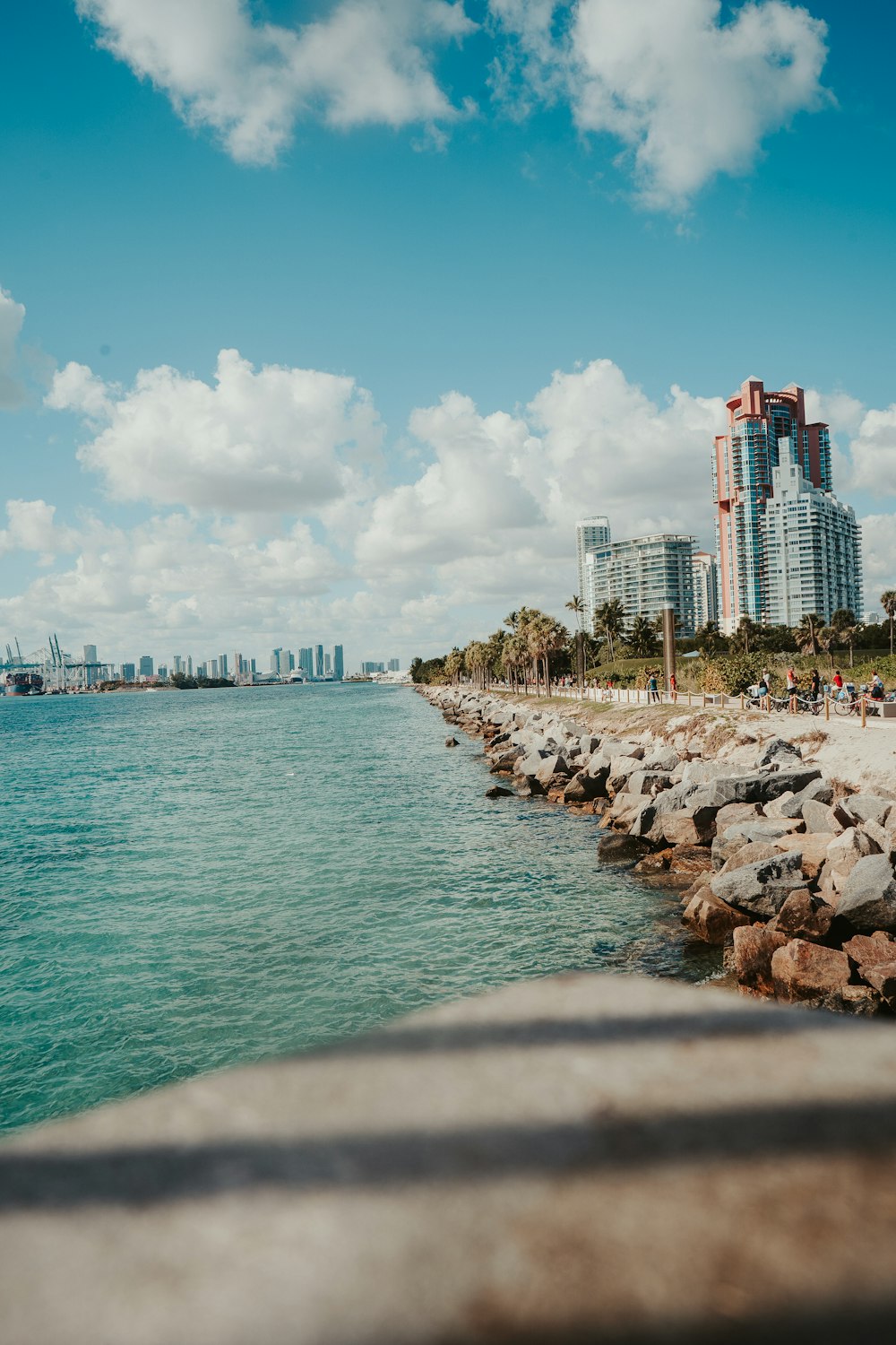 a view of a body of water with a city in the background