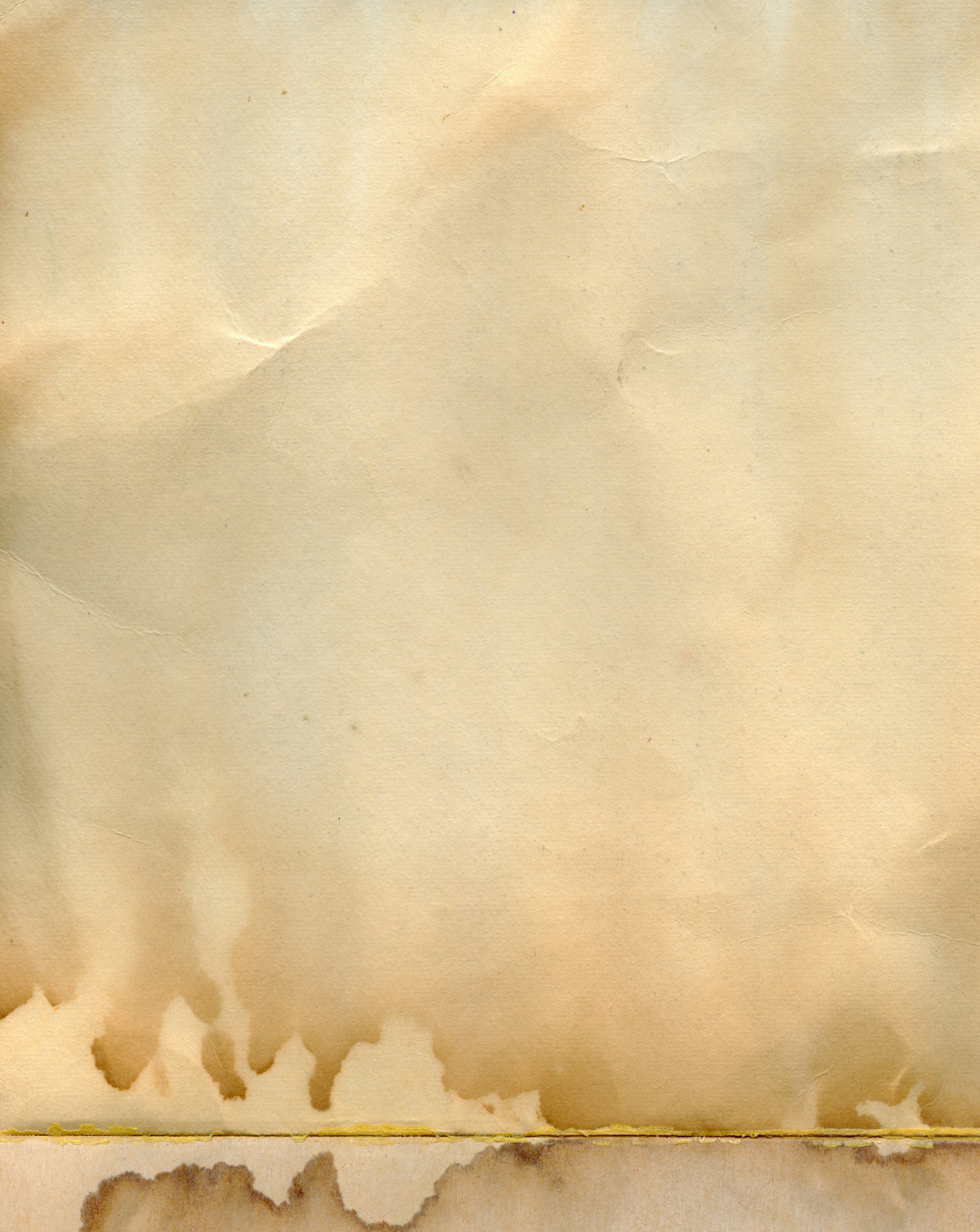 an old piece of paper with torn edges