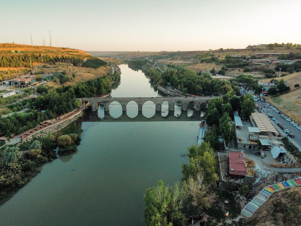 an aerial view of a bridge over a river