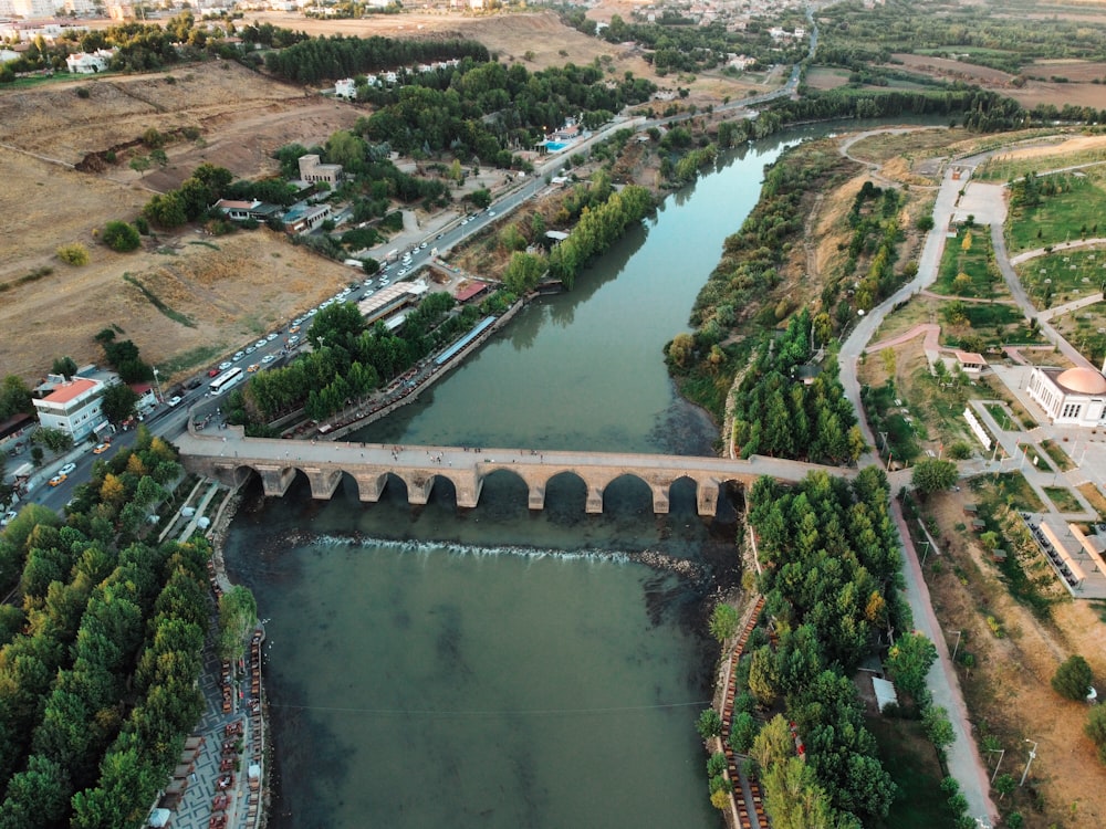 an aerial view of a bridge over a river