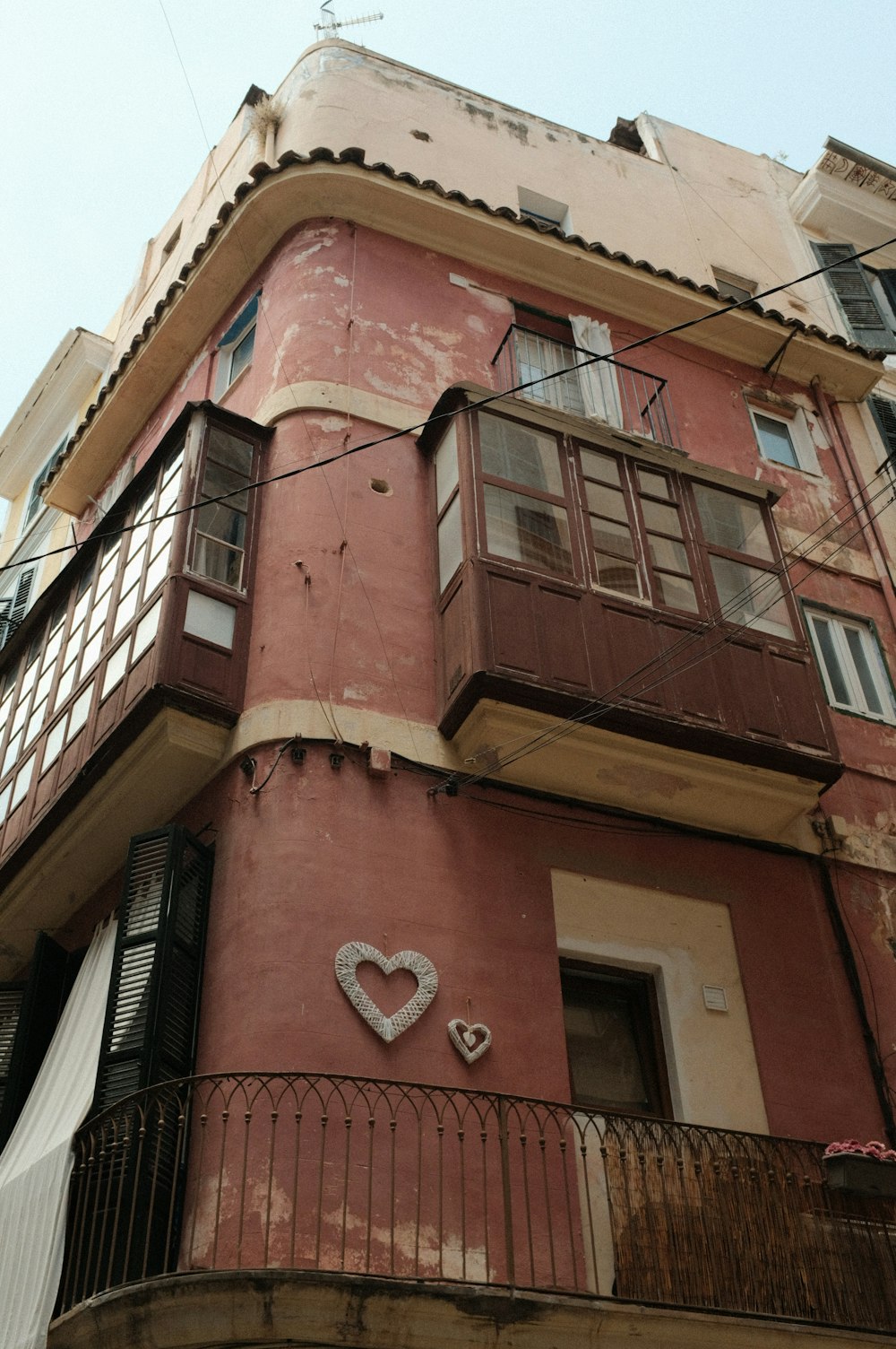 a building with a heart on the side of it