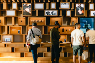 A vibrant display of electronic gadgets neatly arranged on a modern shelf.