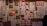 A collage of protest posters is displayed on the wall, featuring bold texts advocating for women's rights. The dominant messages include phrases like 'Women's Liberation' and 'Women Need Not Always Keep Their Mouths Shut.' There are artistic renderings of human figures and parts of slogans that focus on women's empowerment and anti-war sentiments.