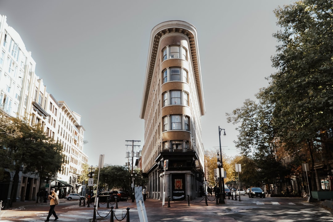 a tall building sitting on the side of a street,