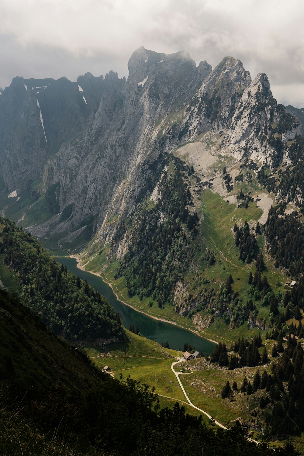 a view of a mountain range with a river running through it