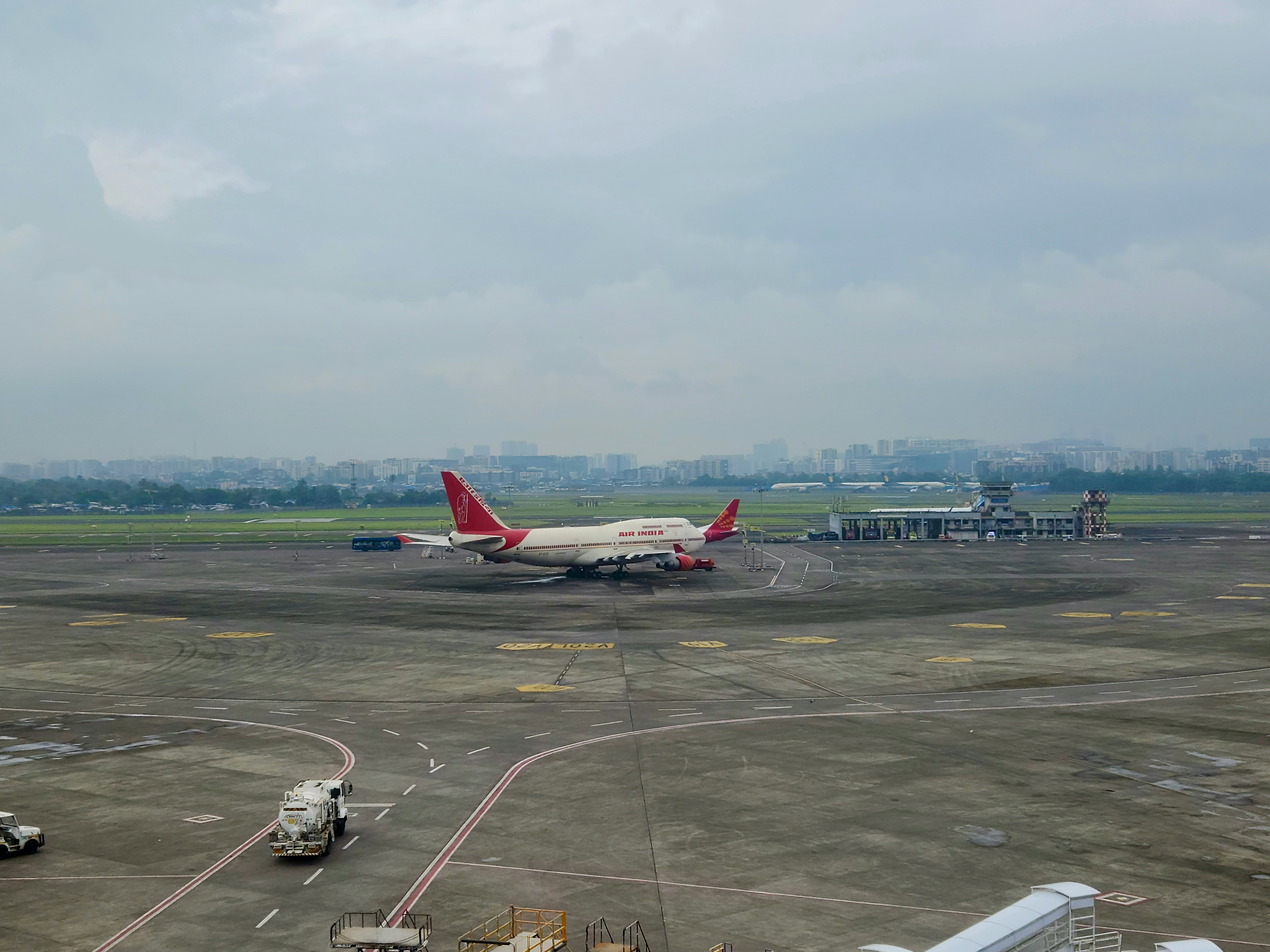 a large jetliner sitting on top of an airport tarmac, Air India was one of the early adopters of the 747. The carrier’s tryst with the 747 began when it acquired its first jumbo in 1971. Air India had already been operating an all-jet fleet by then, but this new addition further consolidated its position as a luxury carrier. Several 747-200s were added to the carrier’s fleet over the next two decades, followed by the 747-300 in the 80s. The 1990s saw the introduction of the 747-400 version of the plane with the stretched upper deck, which served the airline until a few years ago.