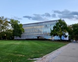 An exterior shot of a laboratory building surrounded by greenery.