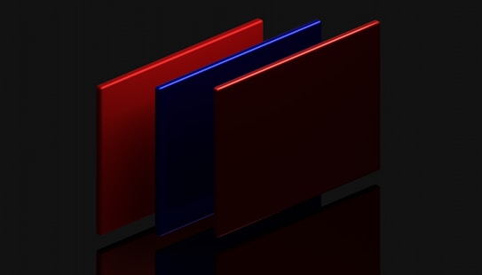 Three parallel rectangular panels stand vertically against a black background, with two panels in red and one in blue. Their glossy surfaces reflect subtle light, creating a sleek and modern aesthetic.