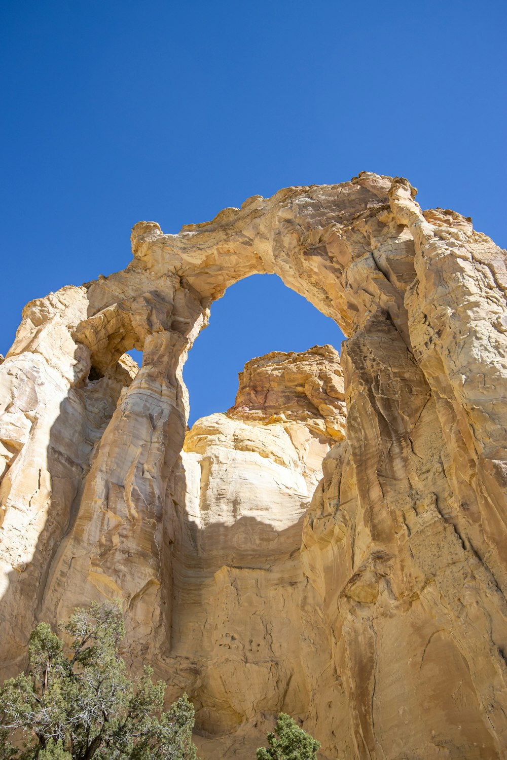 a rock formation with an arch in the middle