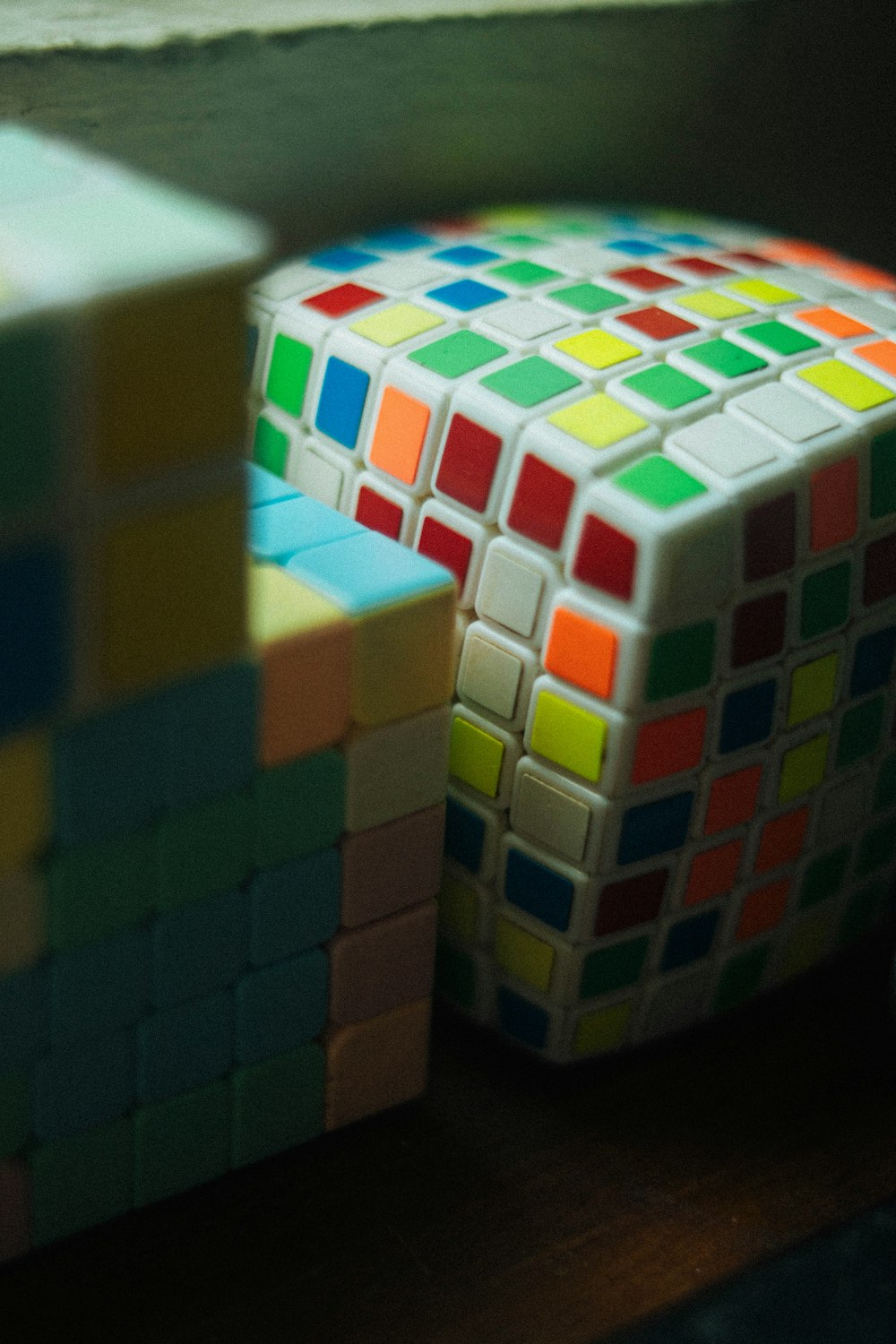 a close up of a rubik cube on a table