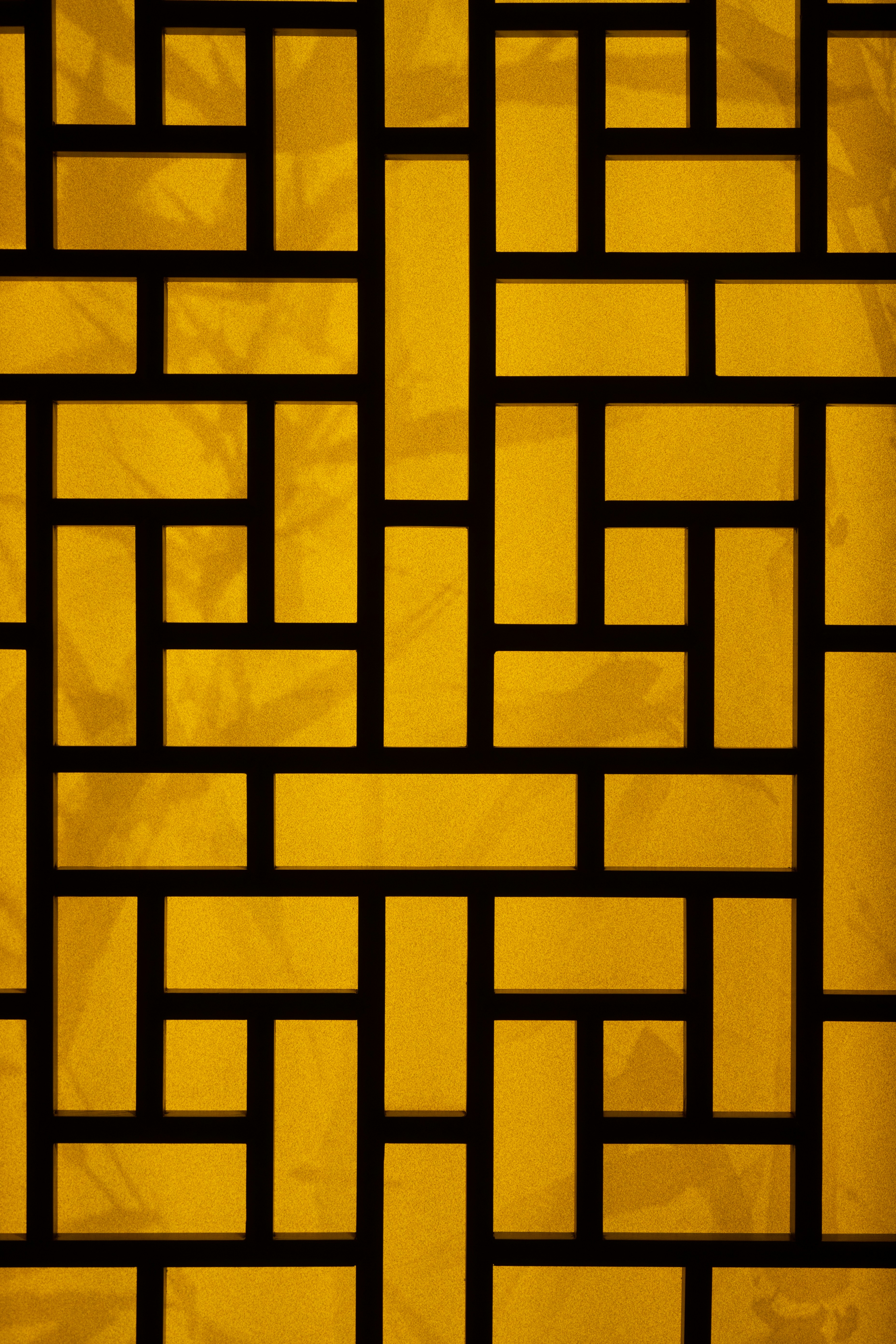 a close up of a pattern on a wall