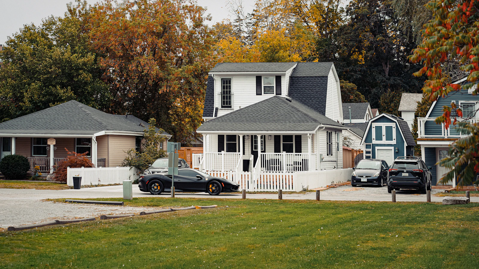 Cars parked in front of a residential home