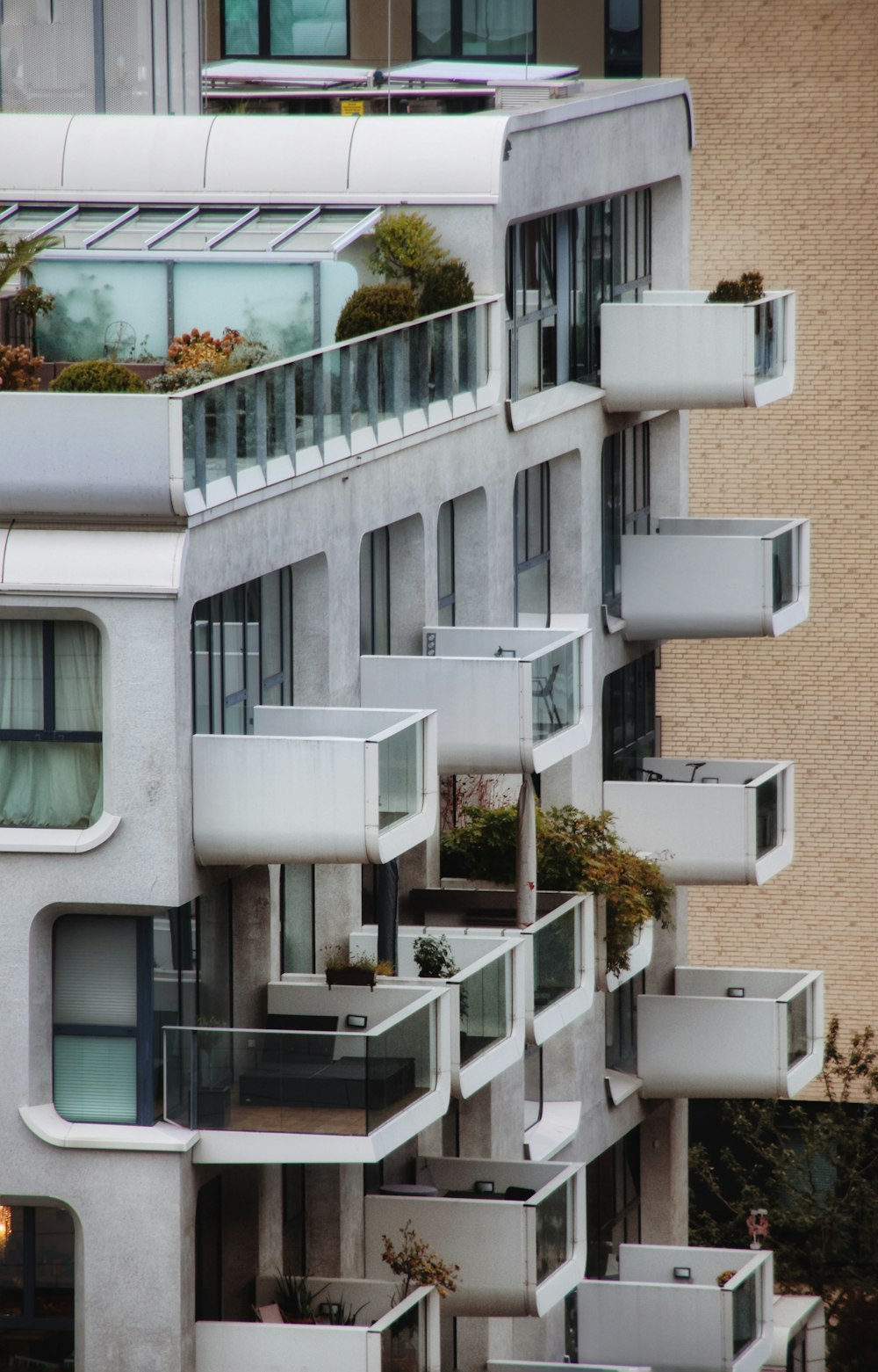 an apartment building with balconies and balconies on the balconies