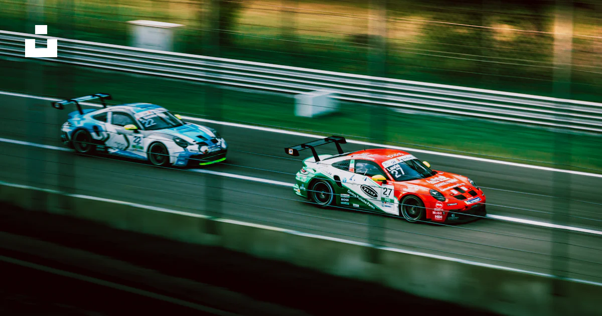 Two race cars racing on a track near each other photo – Free Italy ...