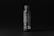 A sleek, futuristic cosmetic product bottle with a minimalist white and gray background reflecting high-tech design.