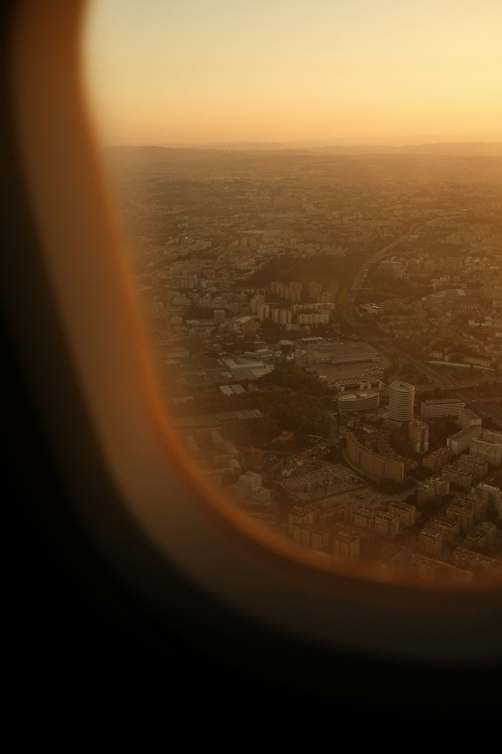 a view of a city from an airplane window