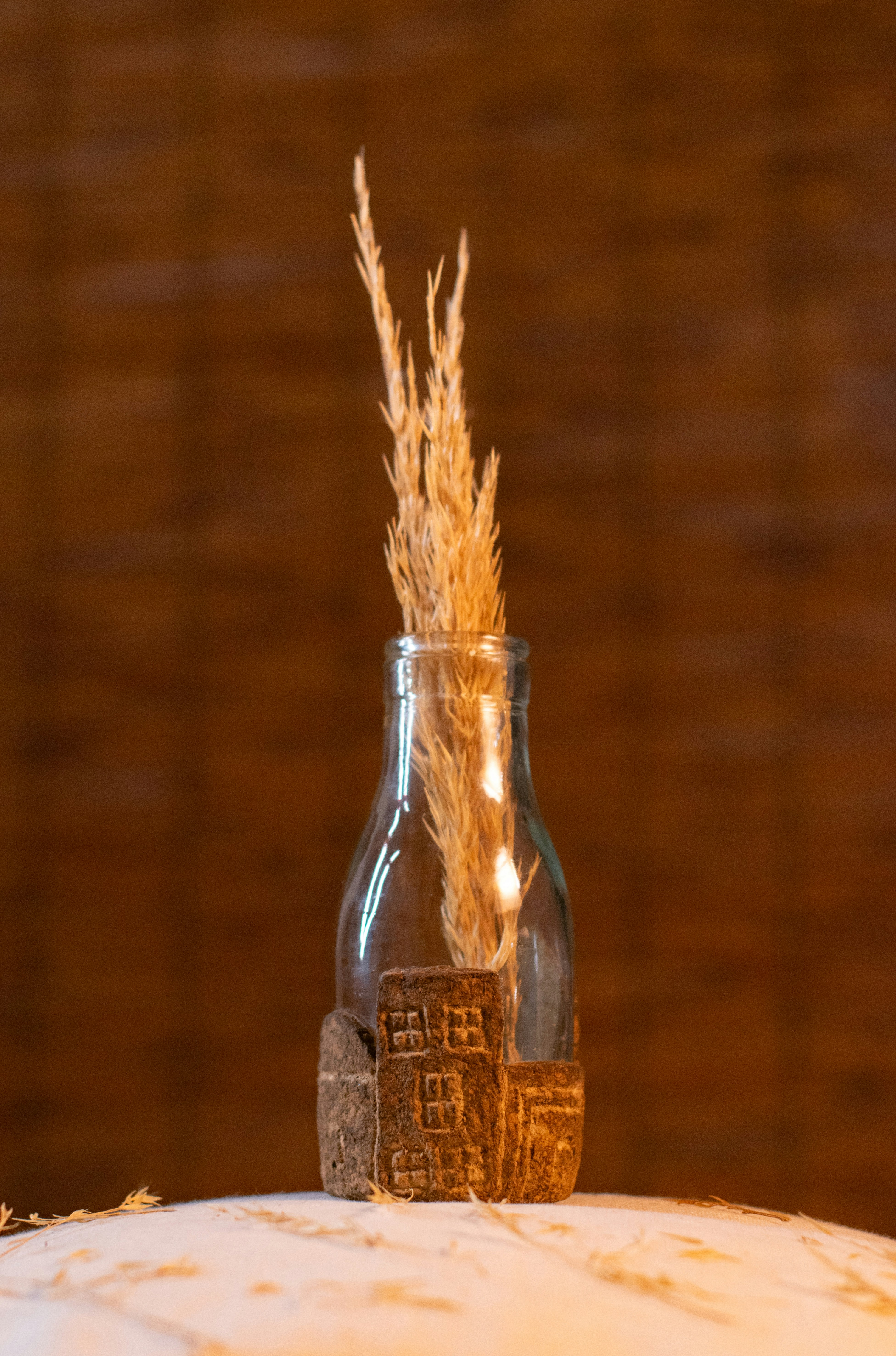 Rice grains and a bottle of rice water