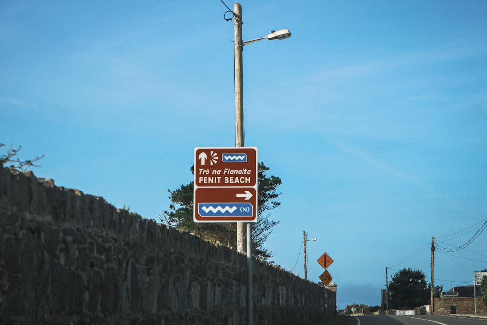 a street sign on the side of a road