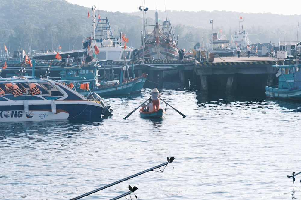 a person paddling a boat in a body of water