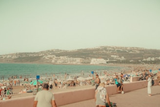 The Literary Titans of Tangier a crowded beach in Tangier