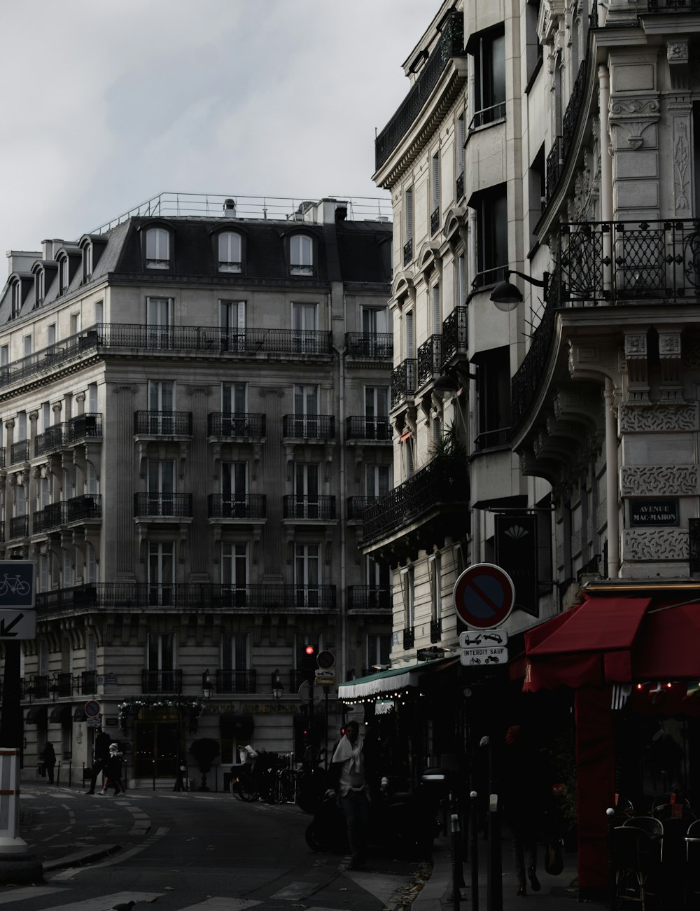 a city street filled with lots of tall buildings