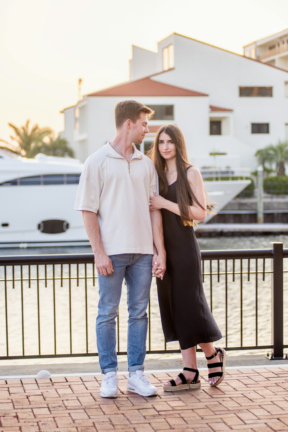 a man and a woman standing next to each other