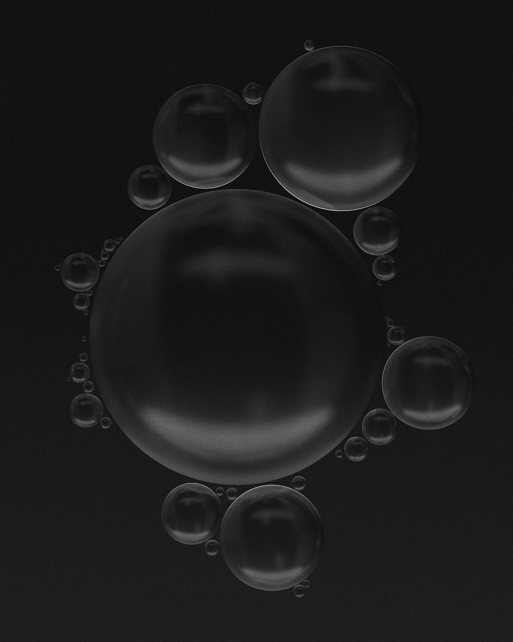 a black and white photo of soap bubbles