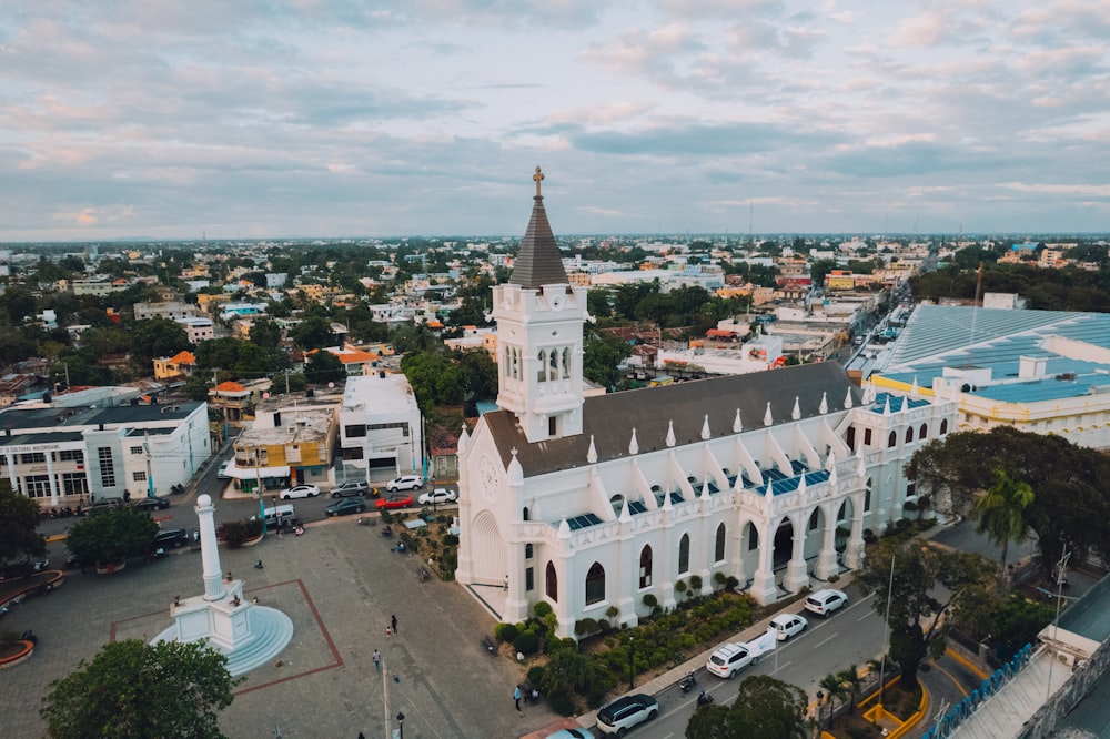 an aerial view of a city with a clock tower