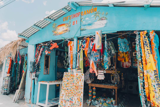 a blue store with lots of items on display