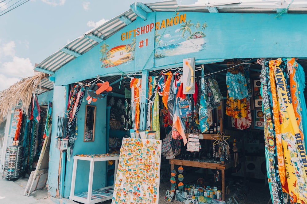 a blue store with lots of items on display