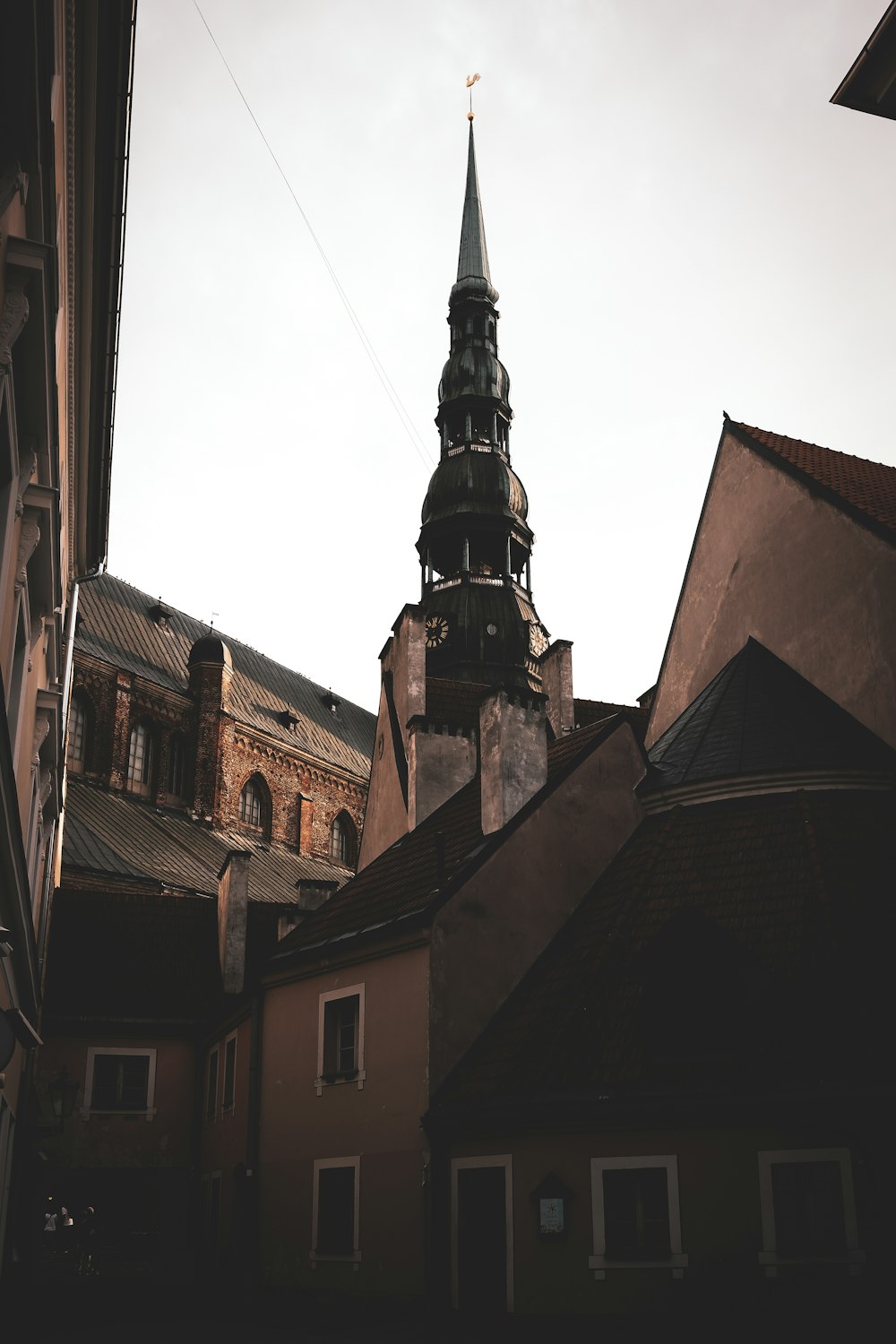 a steeple of a building with a clock on it