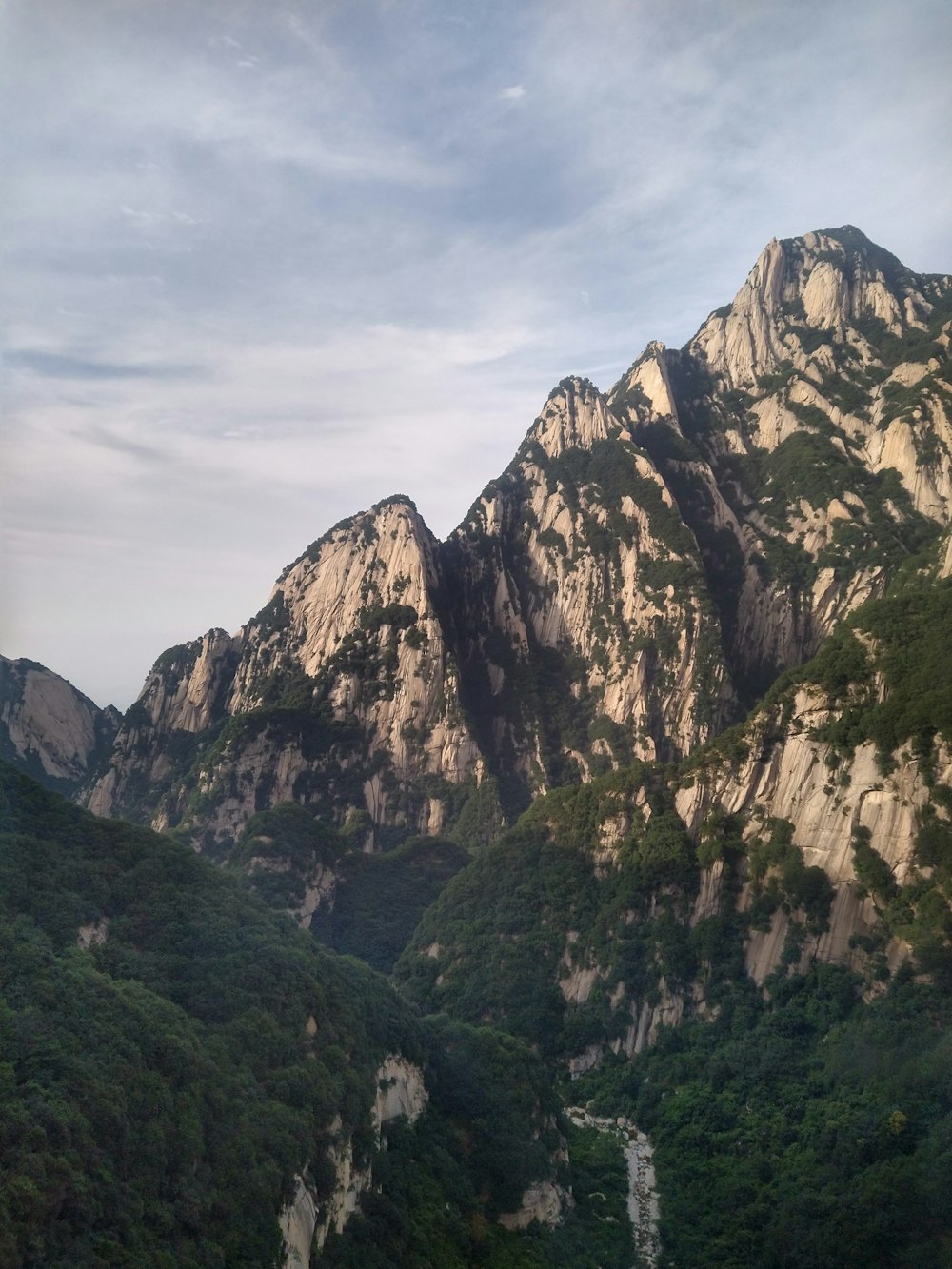 a mountain range with a river running between it