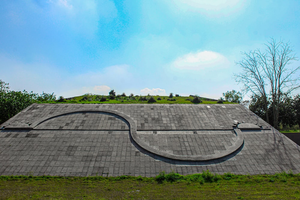 a skateboarder is doing a trick on a ramp