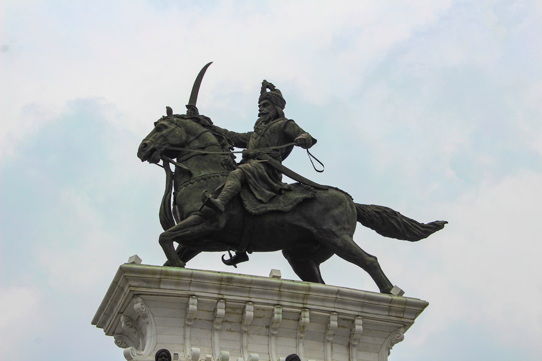 a statue of a man riding a horse