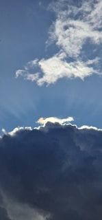 A dramatic depiction of the sky symbolizing divine greatness.