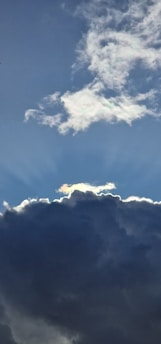 A dramatic depiction of the sky symbolizing divine greatness.