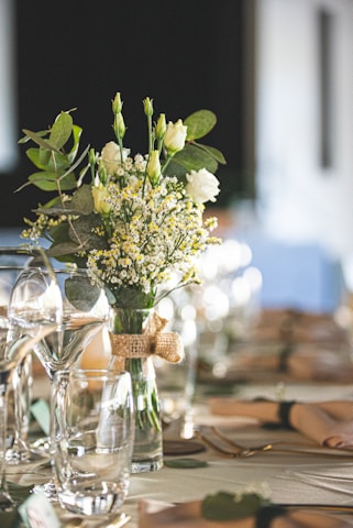 A sparkling clean apartment ready for guests with fresh flowers on the table.