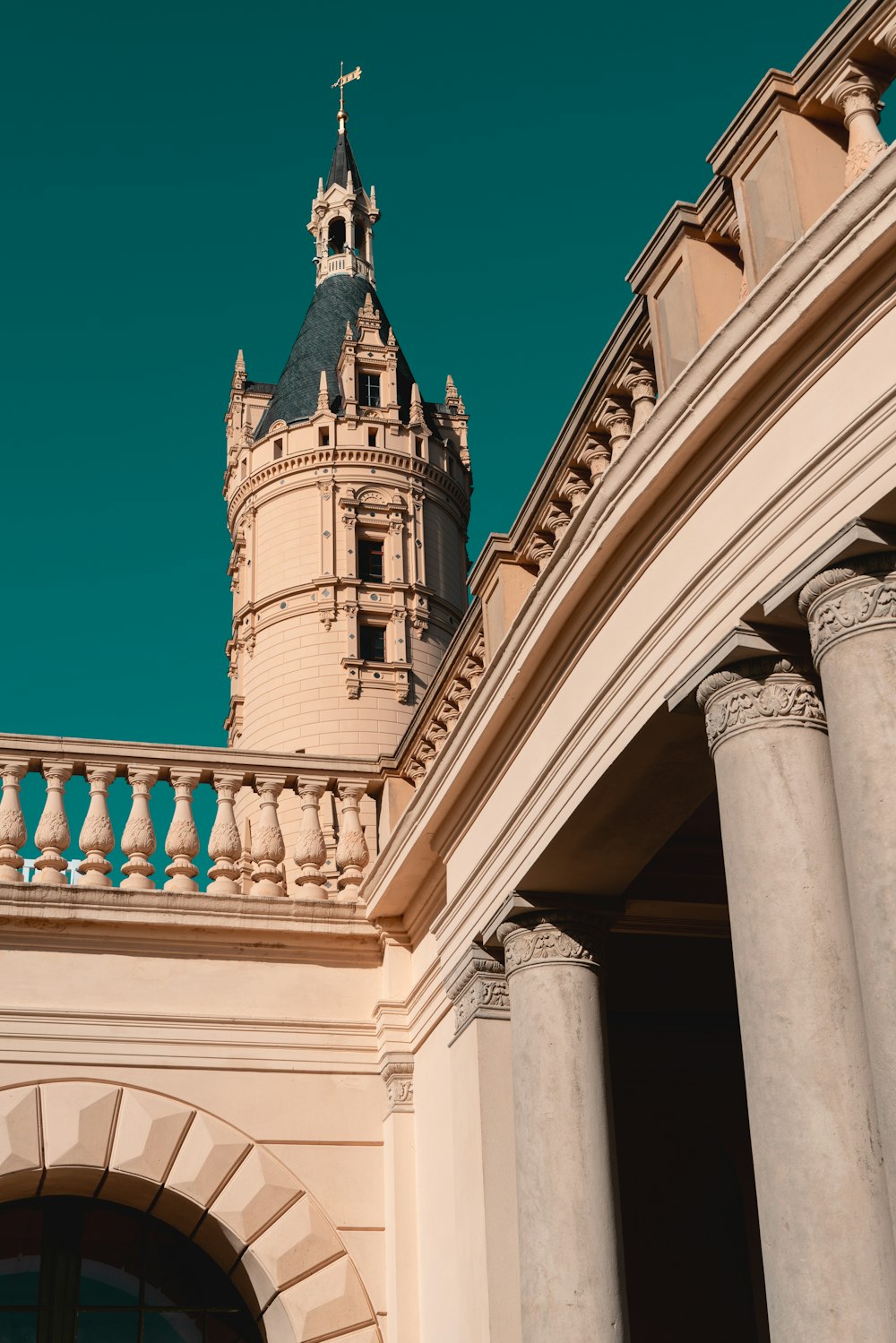 a tall building with a clock on the top of it