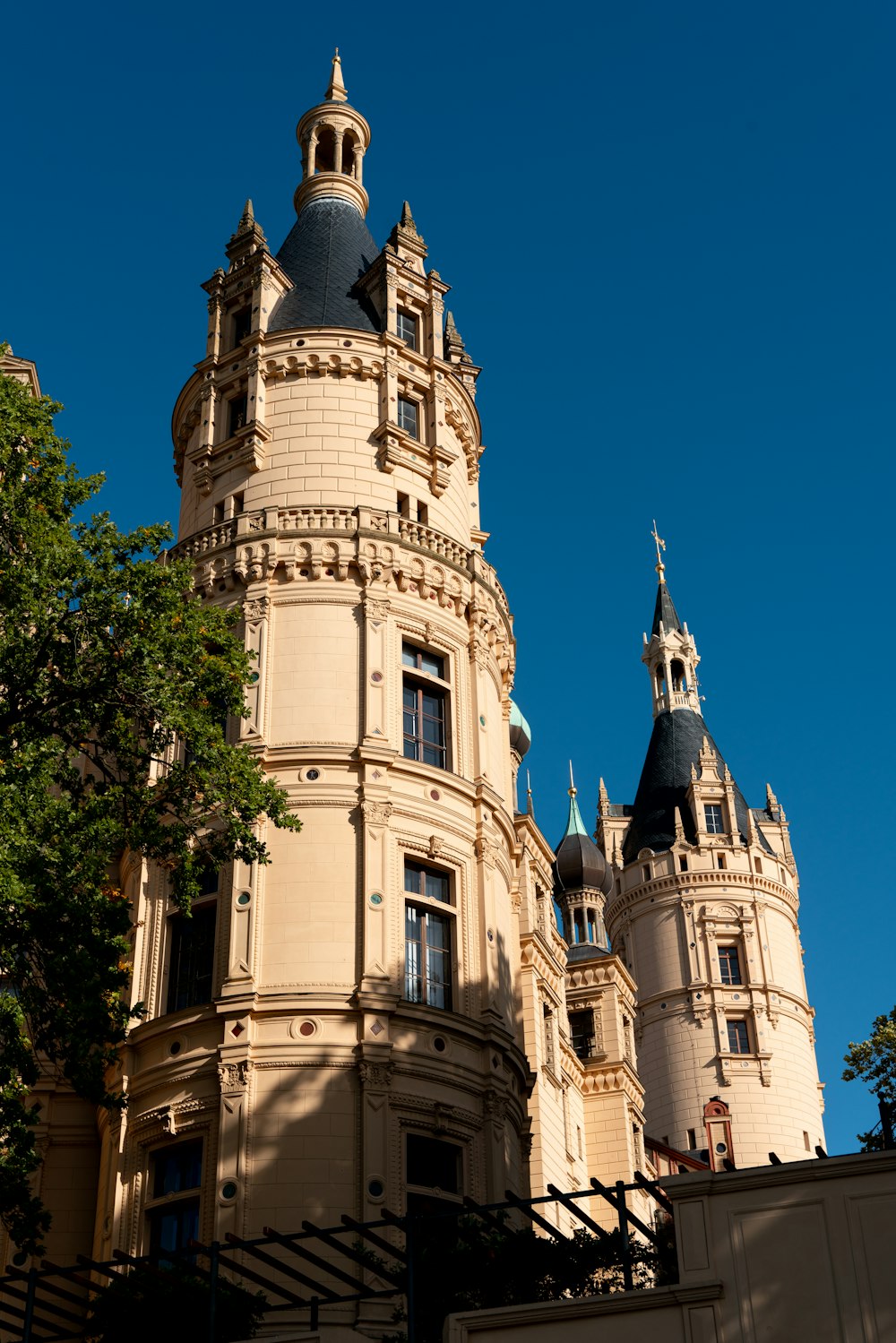 a tall building with a clock on the top of it