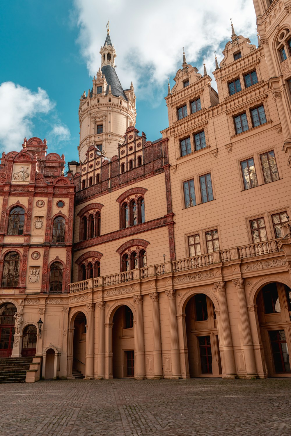 a large building with a clock on the top of it