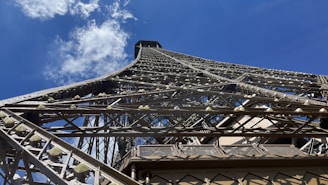 An aerial view of a completed steel structure against a clear sky.