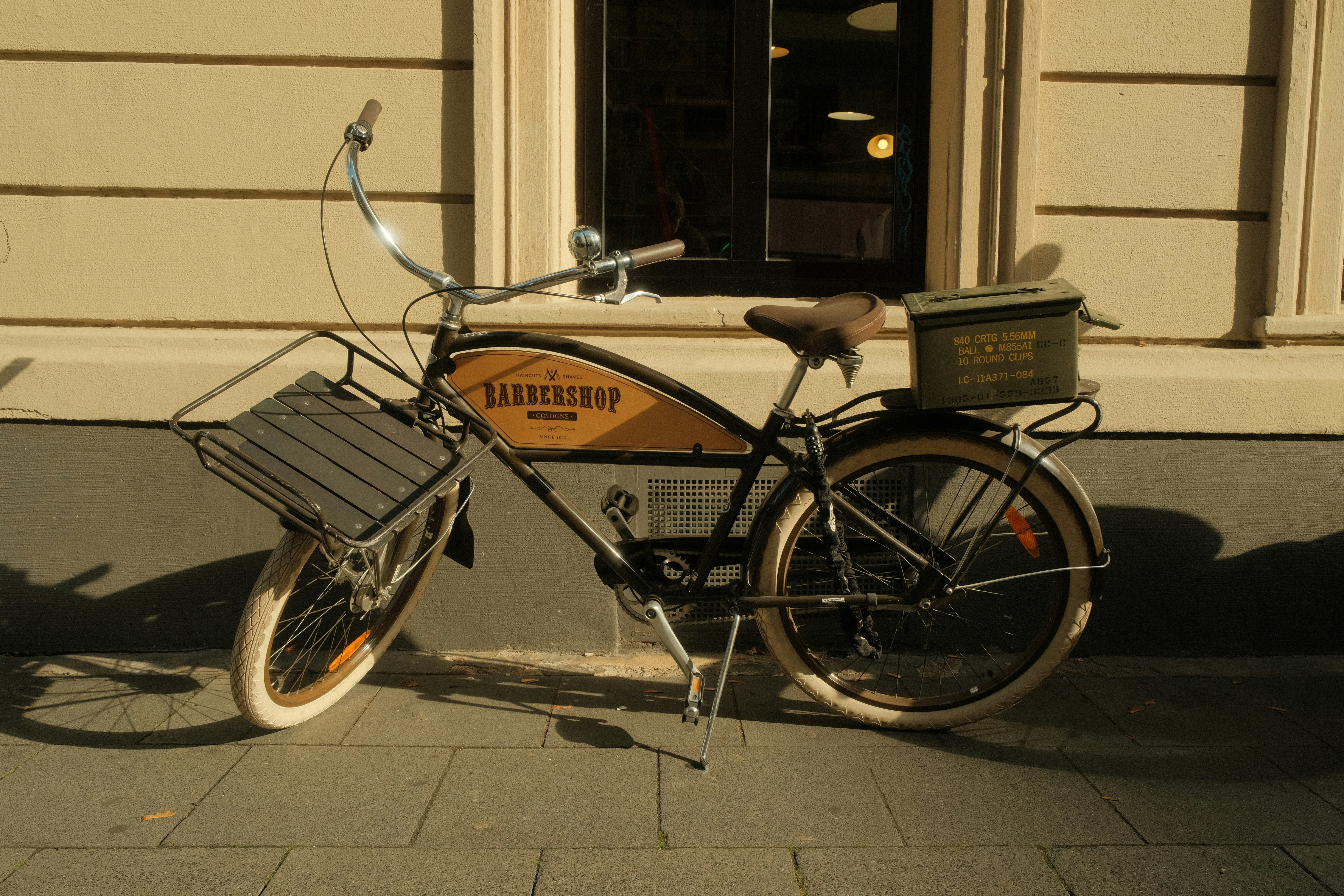 a bike parked on the side of a building