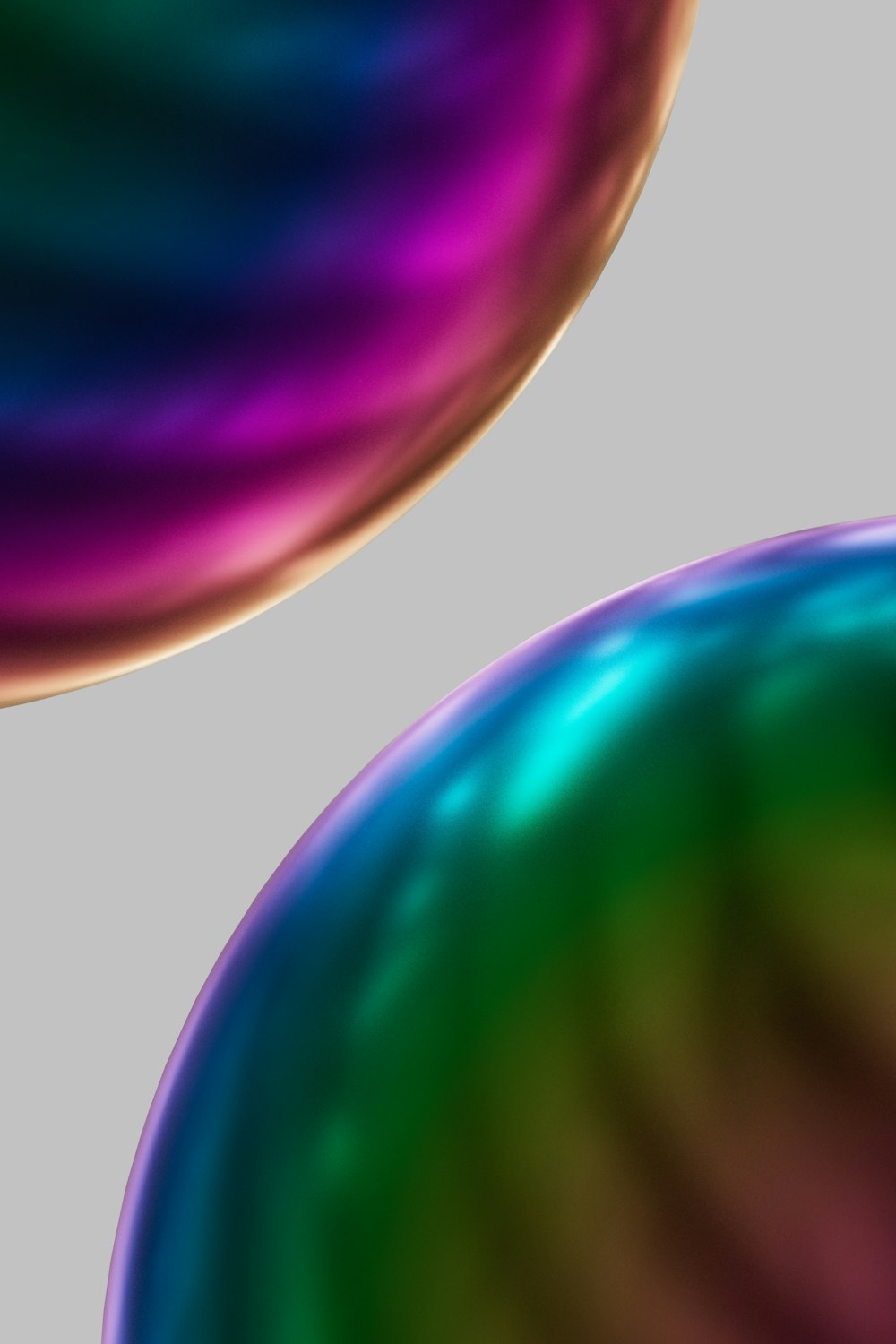 a close up of two different colored balls