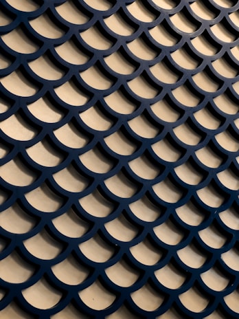 Classic legal scales with a silver gradient and rounded corners, set against a tapestry blue background