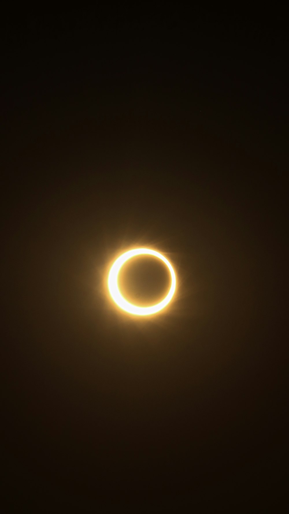 a ring of light in the dark sky