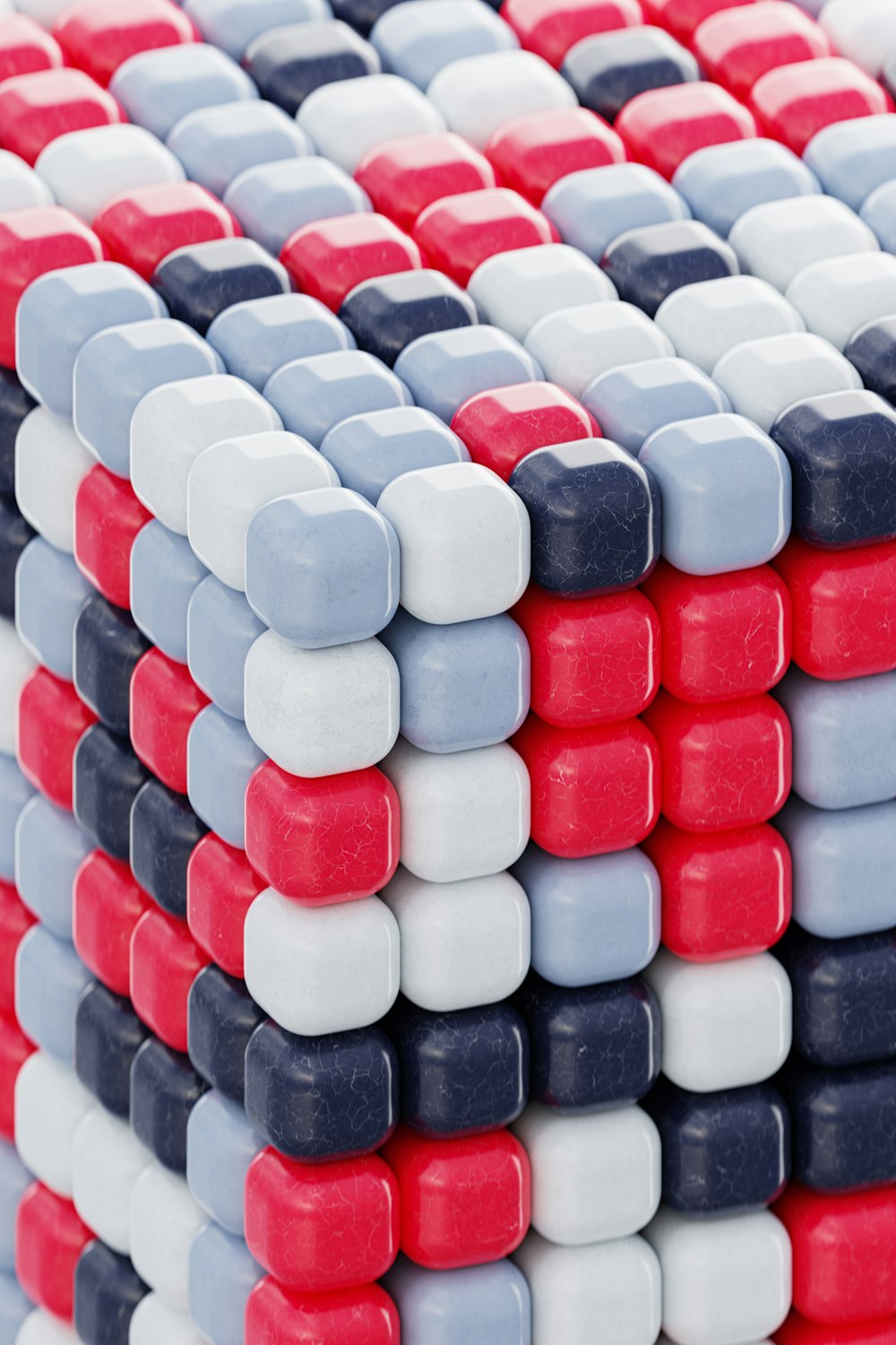 a red, white, and blue puzzle piece