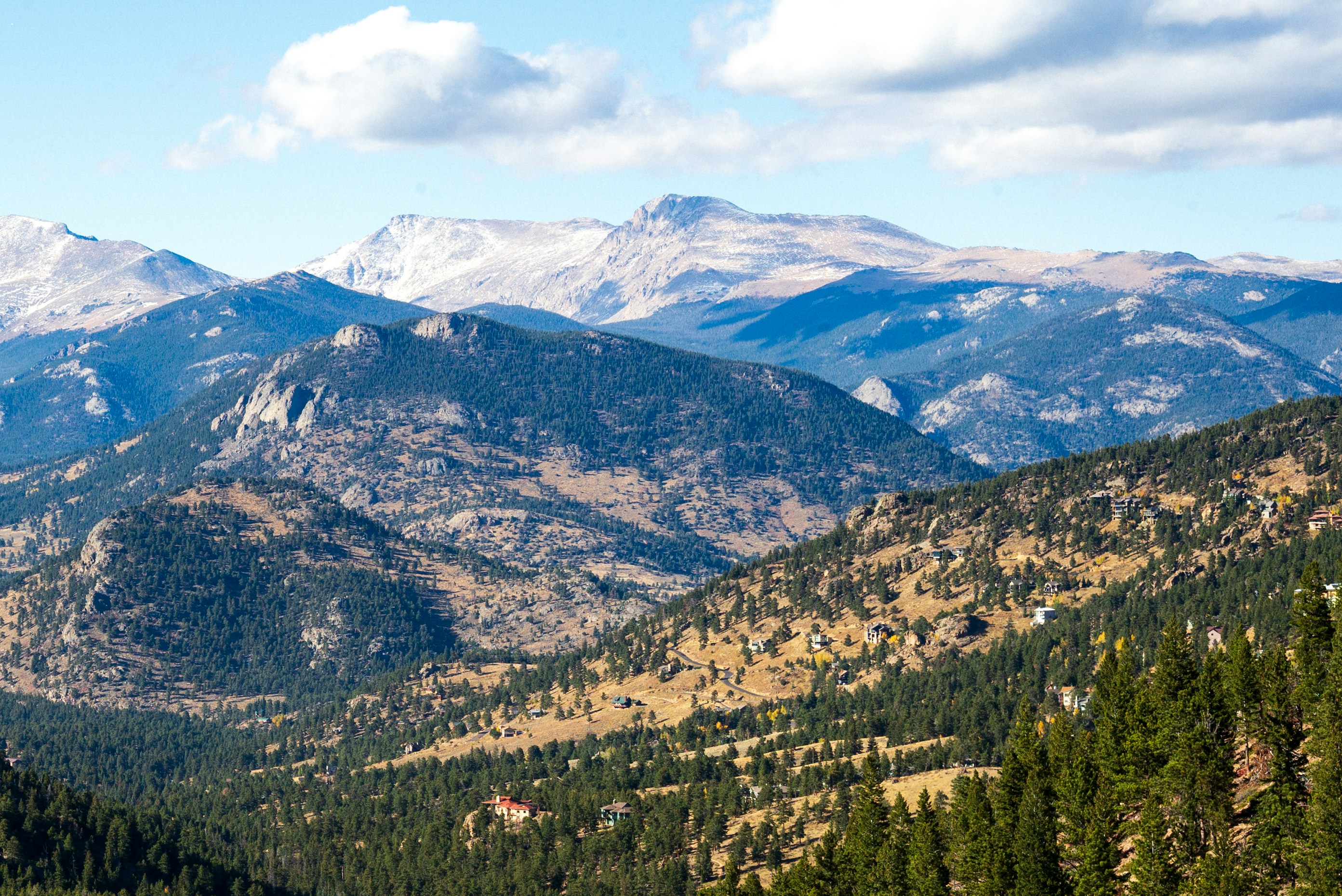A view of a mountain range in the distance photo Free Estes park